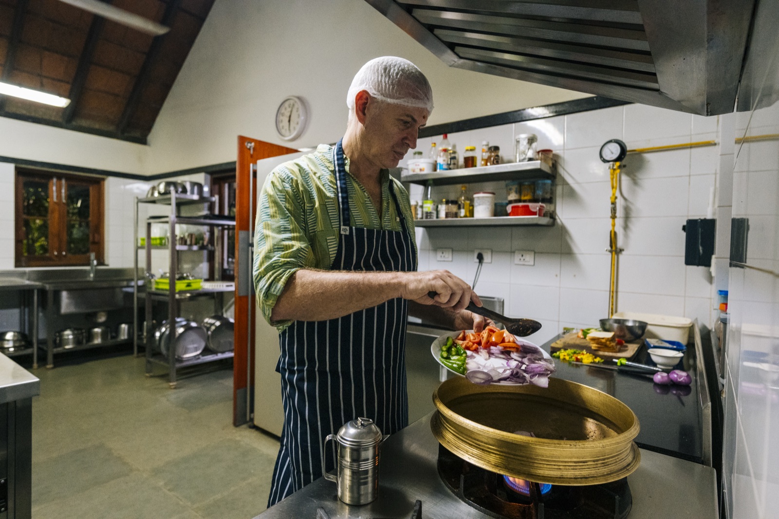 Cooking a Kerala dish at the pan
