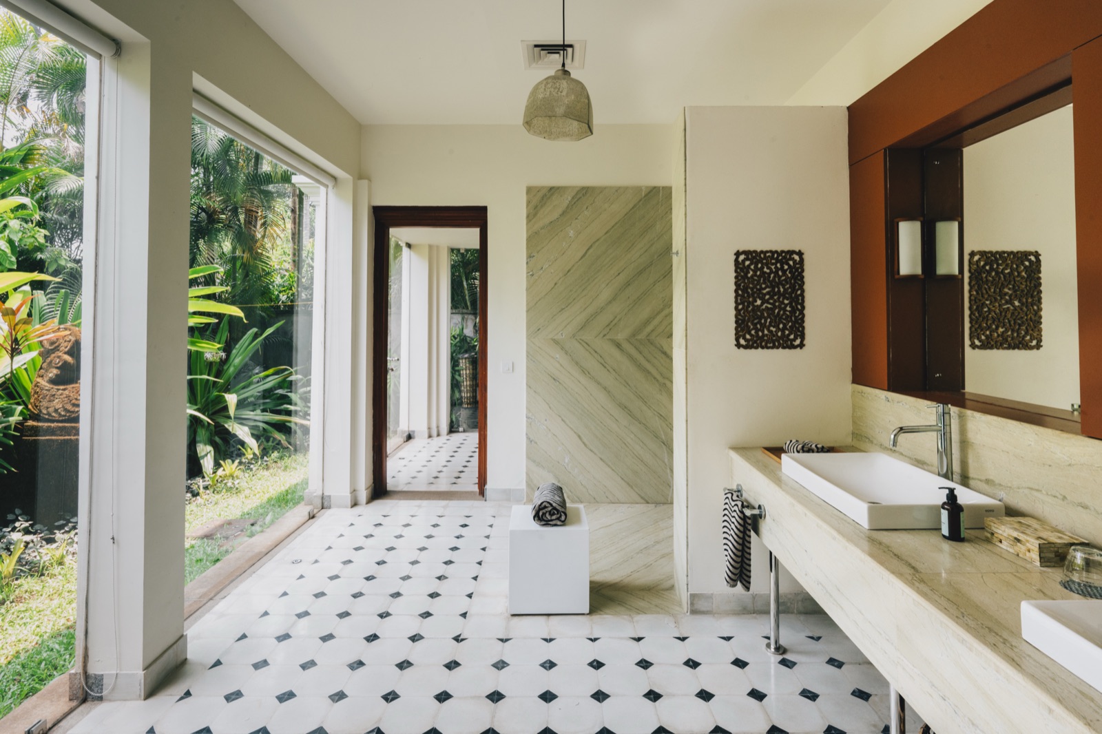 A marble bathroom with garden light