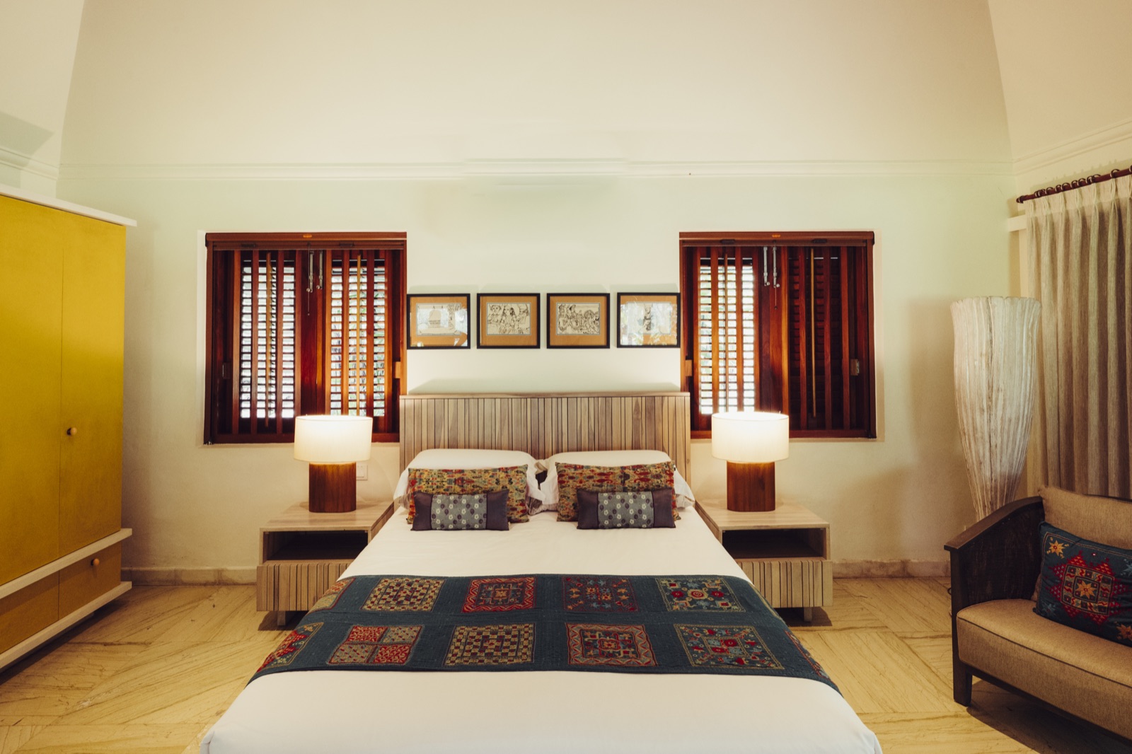 The Hanuman room below a white vaulted ceiling