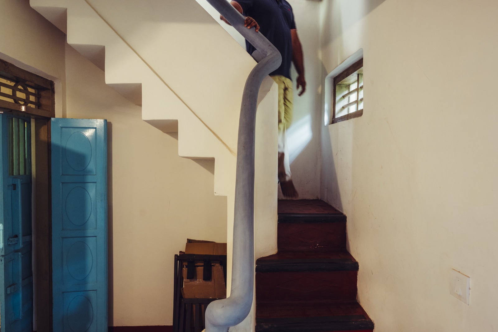 The staircase in the ancestral home linking Radha's upstairs bedroom and bathroom below