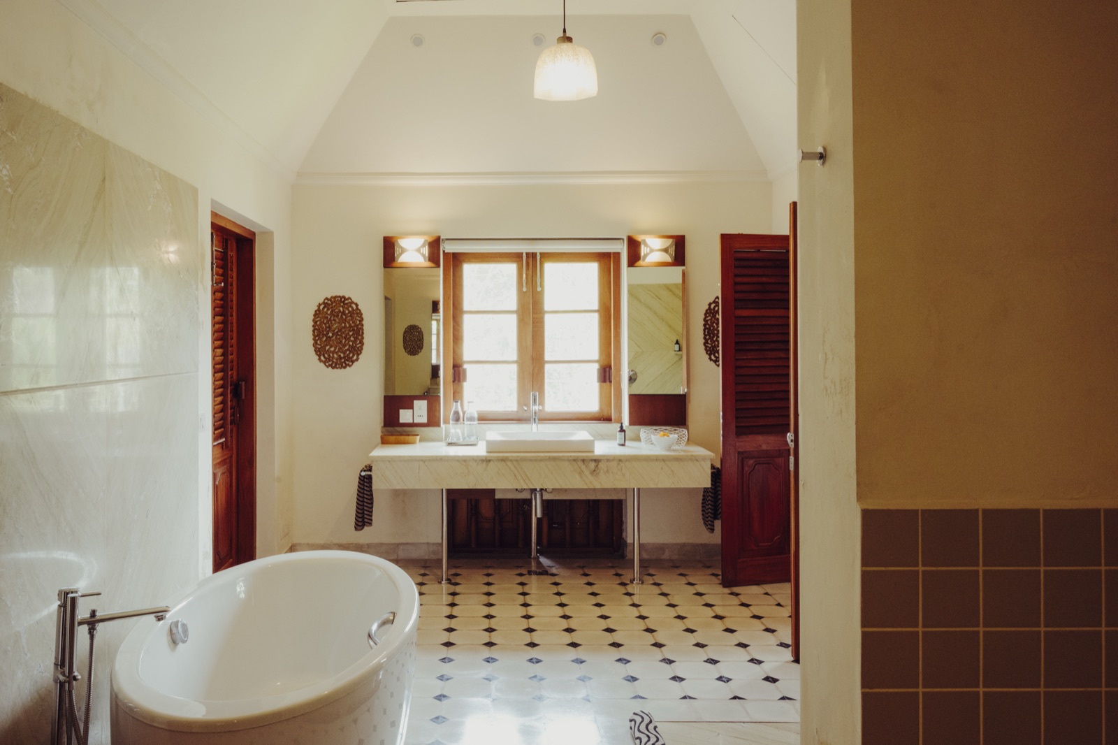 The Sita Suite bathroom with a freestanding tub